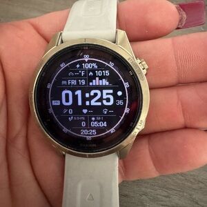 Garmin Smartwatch with Gold Bezel and Cream Band